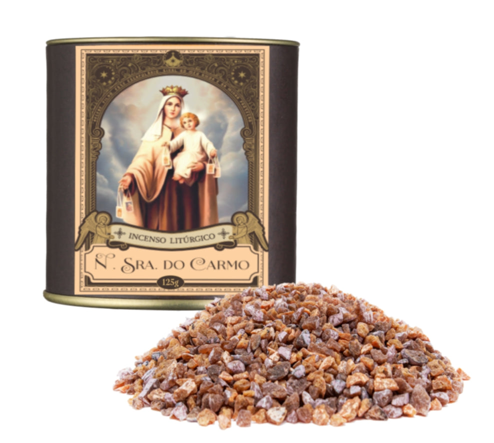 125g canister of Milagros Our Lady of Mount Carmel resin incense beside a pile of copper-colored Carmelite resin grains.