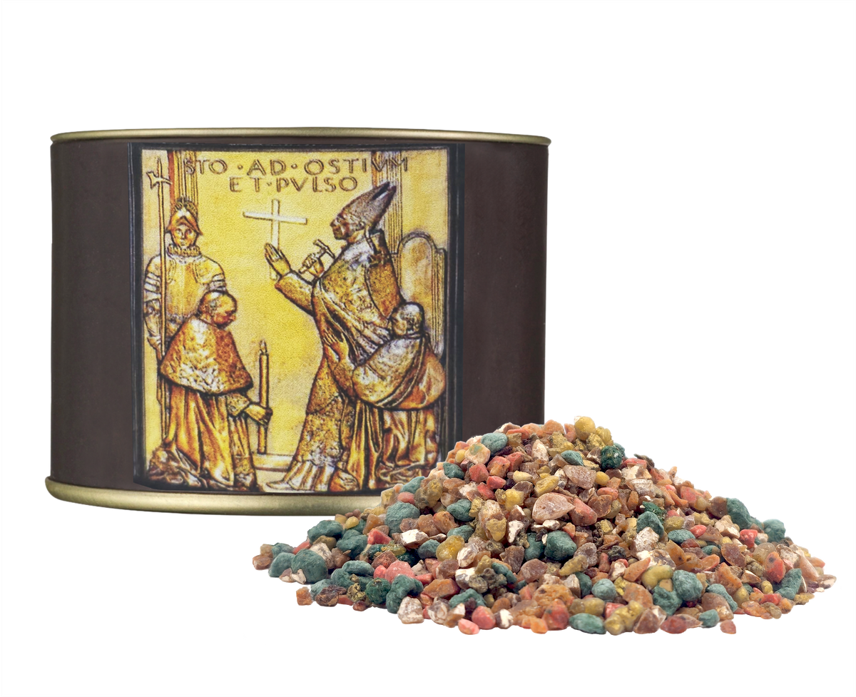 50g canister of Milagros Peregrinantes in Spem resin incense beside a pile of resin grains.