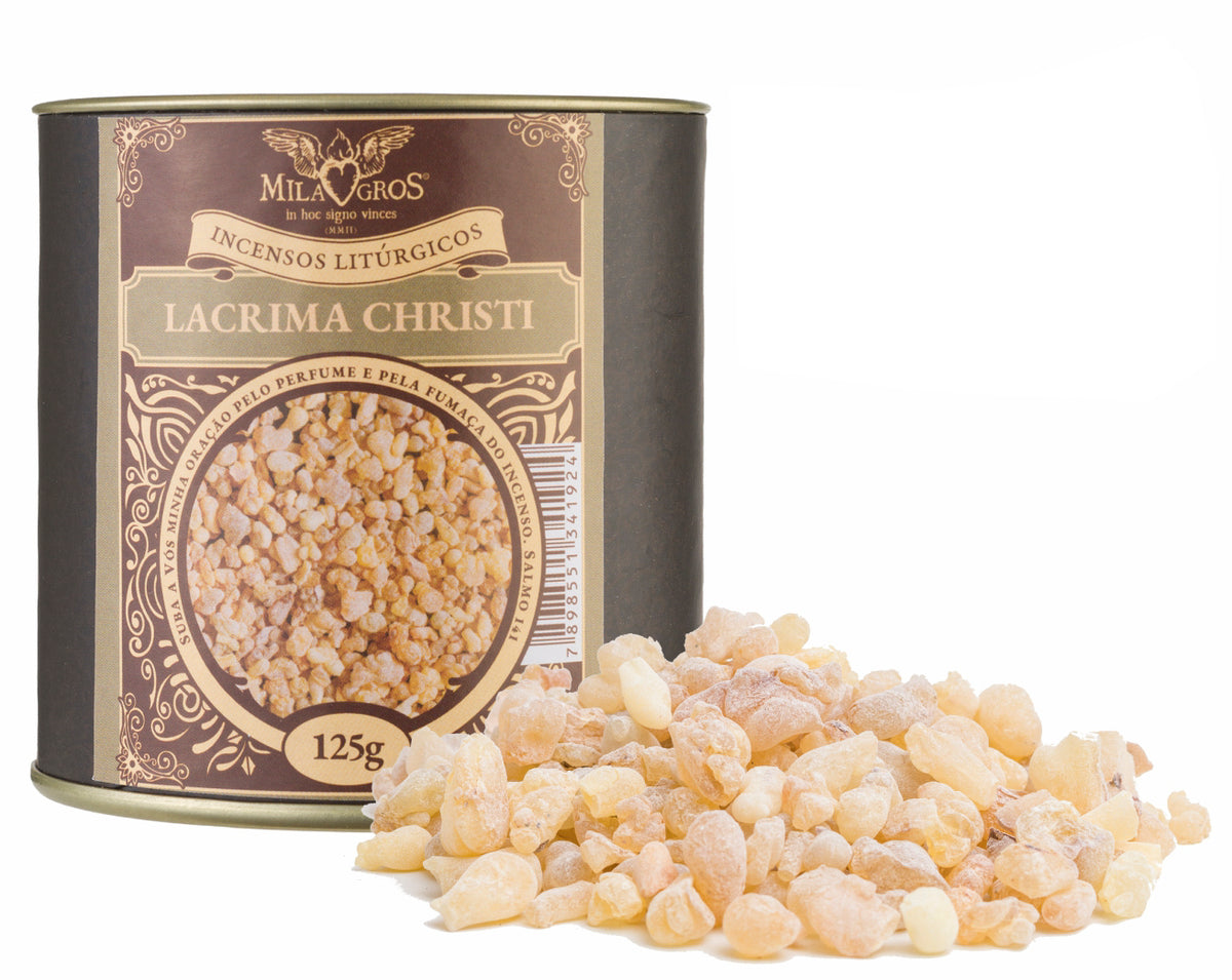 125g canister of Milagros Olibanum Lacrima Christi resin incense beside a pile of resin grains.