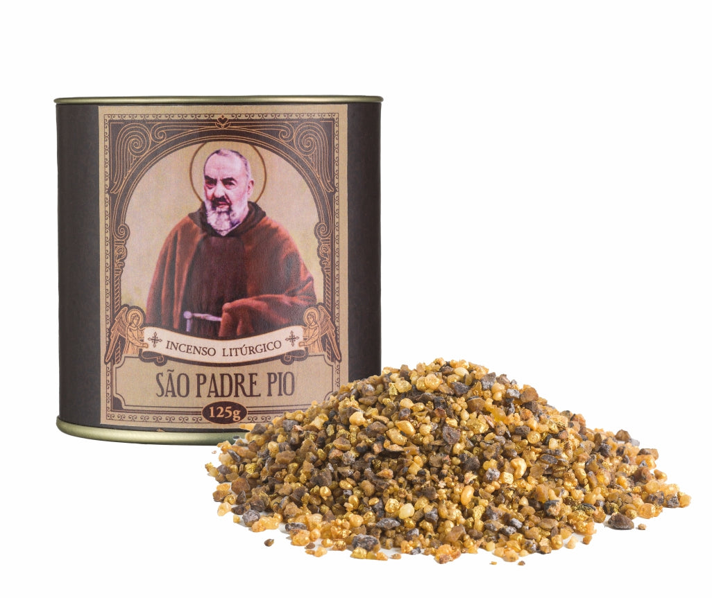 125g canister of Milagros Saint Padre Pio resin incense beside a pile of resin grains.