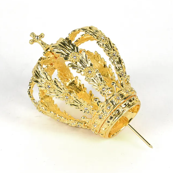 Gold crown hairpin on a white background